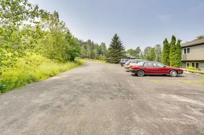 a red car parked on the side of a road at Outdoors, Hiking, Skiing Mountain Vacation Getaway in Tannersville