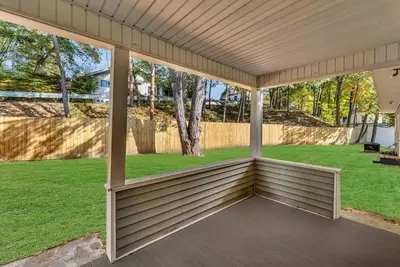 a screened porch with a view of a yard at The Main Lineup 2 - All Star Baseball Rentals in Oneonta