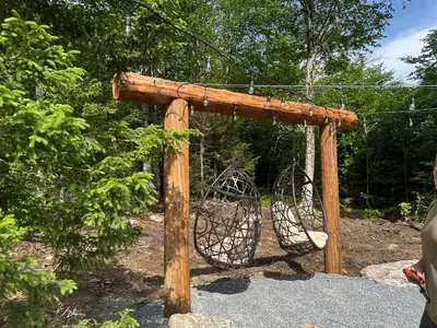 a swing set with two swings at The Greylock Cabin in Florida