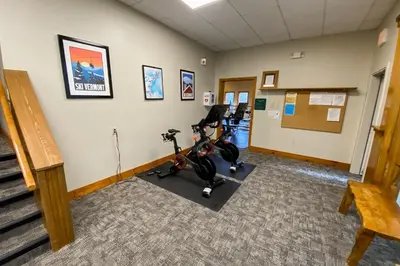 a gym with a exercise bike in a room at Timber Creek #100 in Dover
