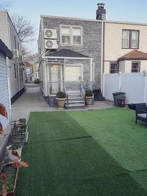 a yard with green grass in front of a house at Amazing private single family house in Glendale
