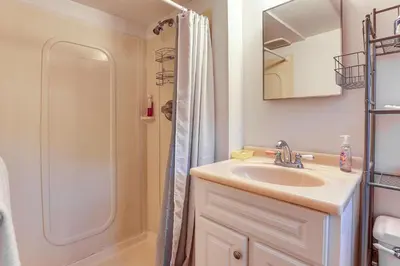 a bathroom with a sink and a shower at 2 Mi to NYC Train WFH-Friendly Greenwich Apt! in Greenwich