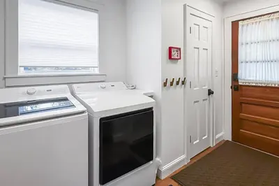 a kitchen with a white stove and a dishwasher at Plymouth Court Turret Retreat in Milford