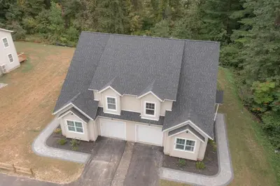 an aerial view of a house with a garage at Spacious 5BR Home KING Bed Wi-Fi Parking in Bloomfield