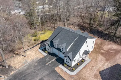 an overhead view of a home with a gray roof at Old, Unlisted in Bloomfield