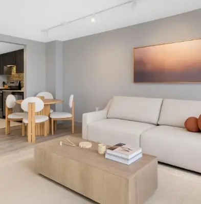 a living room with a white couch and a coffee table at Hartford New 1BR near XL Center and Convention in Hartford
