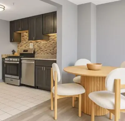 a kitchen with a table and a table and chairs at Hartford New 1BR near XL Center and Convention in Hartford