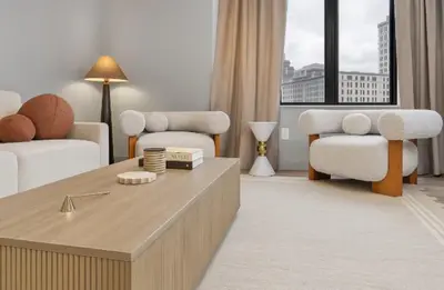 a living room with a couch and a coffee table at Hartford New 1BR near XL Center and Convention in Hartford