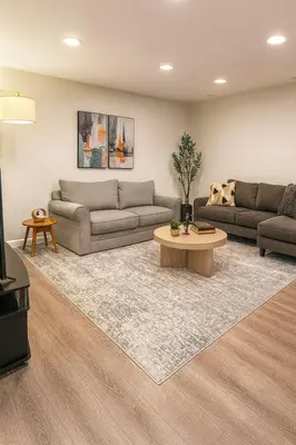 a living room with two couches and a coffee table at Modern 2BR Westville Downtown Near Yale Wifi in New Haven