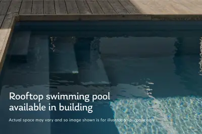 a pool of water with a wooden deck at Blueground Southside doorman nr Brooklyn Bridge NYC-2132 in Brooklyn