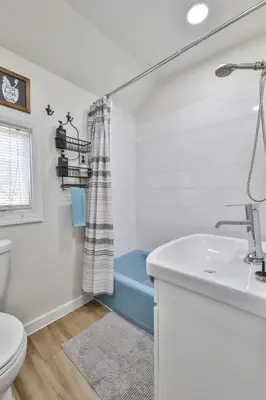 a bathroom with a sink and a toilet at Group Getaway 1 Mile From Hunter Mtn with Fire Pit in Hunter