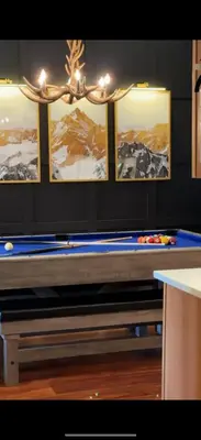 a ping pong table in a room with a ping pong ball at Modern Hunter Mountain Condo Steps from Slopes in Hunter