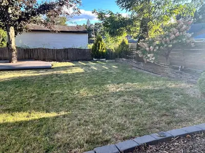 a yard with a fence and a house at Litchfield Retreat, Wineries, Foliage & Skiing in Torrington