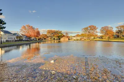 a body of water with trees in the background at Free Parking Spot! Extended Stay Near Newark and NYC in Irvington