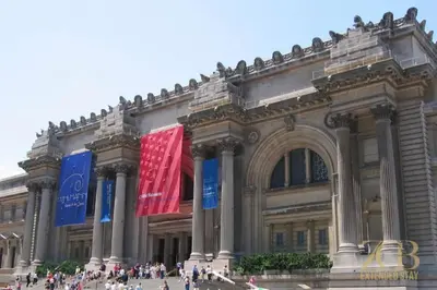 a large building with flags in front of it at Fully Furnished PH Duplex with Private Outdoor Space in New York