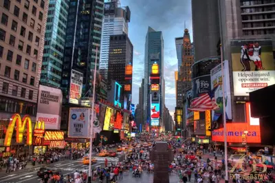 a busy city street with a crowd of people at Fabulous 1 Bedroom in the Heart of Manhattan in New York