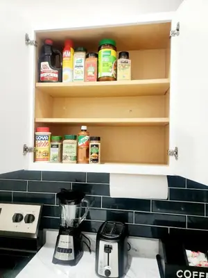 a kitchen counter with a blender on a counter top at Cozy 2BR in Newark for Families, Work & Long Stays in Newark