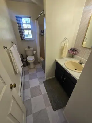 a bathroom with a sink and a toilet at Cozy Private Suite Near Train to NYC in Fairfield