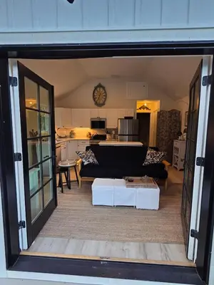 a view of a living room and kitchen from inside a building at Perch, for work or wandering the Litchfield Hills in Southbury