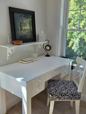 a white desk with a chair next to a window at Perch, for work or wandering the Litchfield Hills in Southbury