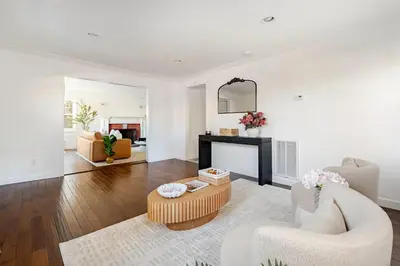 a living room with a couch and a fireplace at Norwalk Retreat in Norwalk