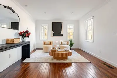 a living room with a table and two chairs at Norwalk Retreat in Norwalk
