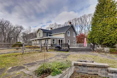 an old house with a fence and a yard at 7 Mi to The Walkway Hudson Valley Adventure Base in Highland