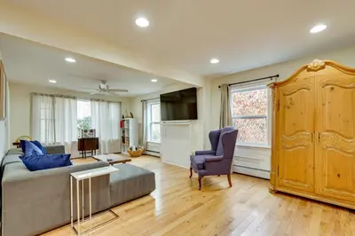 a living room with a bed and a couch and a chair at 7 Mi to The Walkway Hudson Valley Adventure Base in Highland