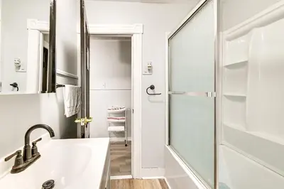 a bathroom with a sink and a shower at 2 Mi to Union College! Newly Renovated Apartment in Schenectady