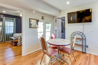a dining room with a table and chairs at 6 Mi to Dtwn New Haven Duplex with Shared Yard in West Haven