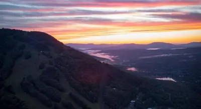a view of a mountain with the sunset in the background at 5 Minutes to Ski Hunter Mountain! Family Friendly - Hot Tub, Sauna, Sunset Views in Hunter