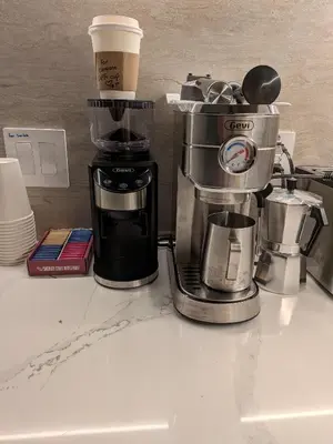 a coffeemaker and a coffee maker on a counter at The Bellagio NYC in New York