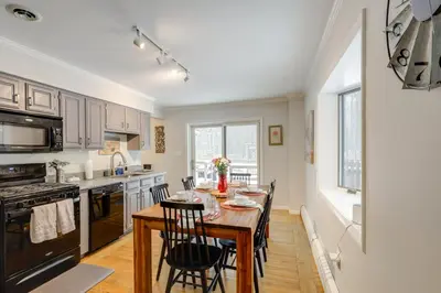 a kitchen with a table and chairs in a room at 8 Mi to Saratoga Race Course Quiet Family Home in Saratoga Springs