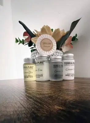 a vase of flowers and some spices on a table at Nona - Cozy 3BR Apt with Parking, Desk & Fast WiFi near Yale, Quinnipiac, SCSU & Hospitals in Hamden