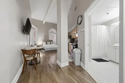 a kitchen and living room with a dining room at Relaxing studio perfect for extended visits in New Haven