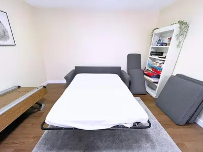 a bedroom with a bed in a room at Skiing Close By! Firepit & Game Room in Prattsville