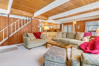 a living room with two couches and a table at Ski, Hike and More! Year-Round Retreat in West Dover in West Dover