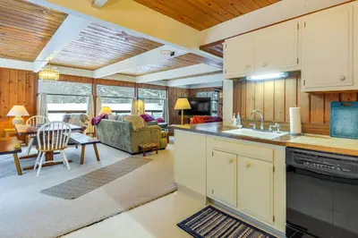 a kitchen with a sink and a living room at Ski, Hike and More! Year-Round Retreat in West Dover in West Dover