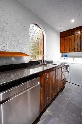 a kitchen with a sink and a dishwasher at Mansion of Belleayre Mountain! POOL, SAUNA, Game Room in Fleischmanns