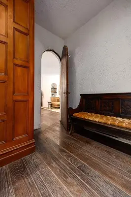 a bedroom with a bed and an open door at Mansion of Belleayre Mountain! POOL, SAUNA, Game Room in Fleischmanns