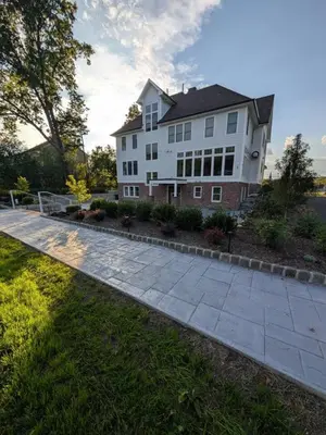 a large white house with a stone driveway at Parkway House Goshen Bed And Breakfast Suite 1 in Goshen