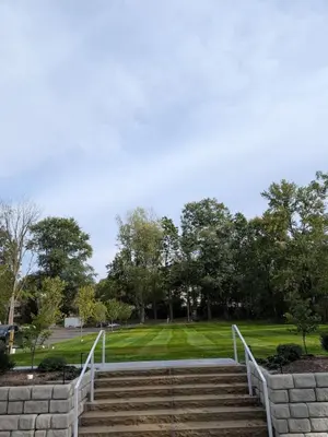 a set of stairs leading to a park with trees at Parkway House Goshen Bed And Breakfast Suite 5 in Goshen
