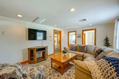 a living room with a couch and a table at Heart of Five College Consortium! Hadley Home in Hadley