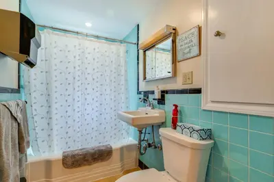 a bathroom with a toilet and a sink at Heart of Five College Consortium! Hadley Home in Hadley