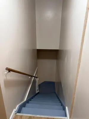 a staircase with blue steps in a room at FOR LONGTERM RENTAL 3 BR NEAR YALE SCIENCE CENTER-MUNSON St in New Haven