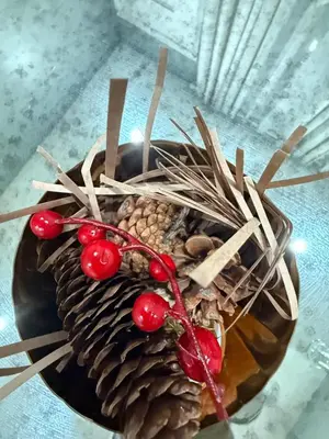 a cake with berries on top of it on a table at Barnes Avenue near Yale in New Haven