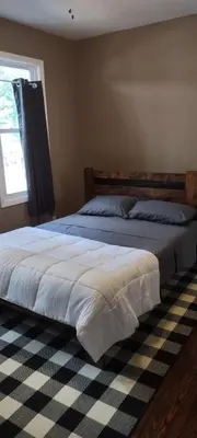 a bedroom with two beds and a window at Fill Your Headspace with Tranquility Near NYC in Maplewood