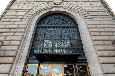 a tall building with a large window on it at Landing Beautiful 1BD Gym in Hartford