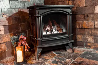 a black fireplace with a group of giraffes in it at Villa Gran Sasso in Hunter