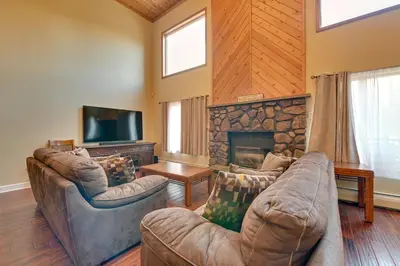 a living room with two couches and a fireplace at Less Than 1 Mi to Hunter Mtn Skiing Family-Friendly Stay! in Lanesville